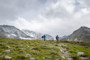 Mountaineer descending from the Tracuit hut, weak and exhausted Mountaineer descending from the Tracuit hut, weak and exhausted